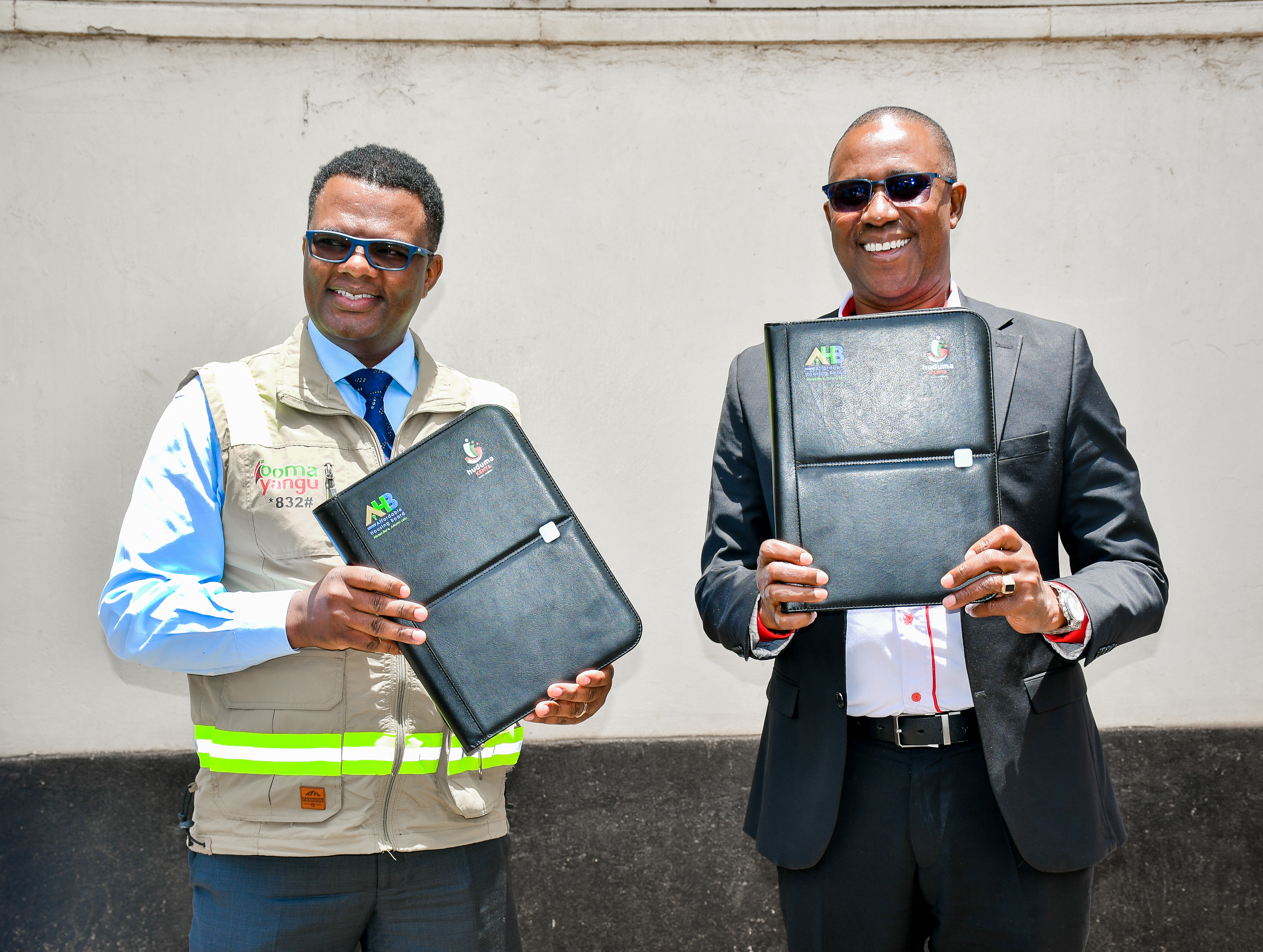 Affordable Housing Board’s Acting Chief Executive Officer Joseph Kagicha (left) and Huduma Kenya CEO Benjamin Kai Chilumo (Right) display the MoU to establish service desks at Huduma Centres, supporting Kenyans seeking home ownership under the Boma Yangu programme.
