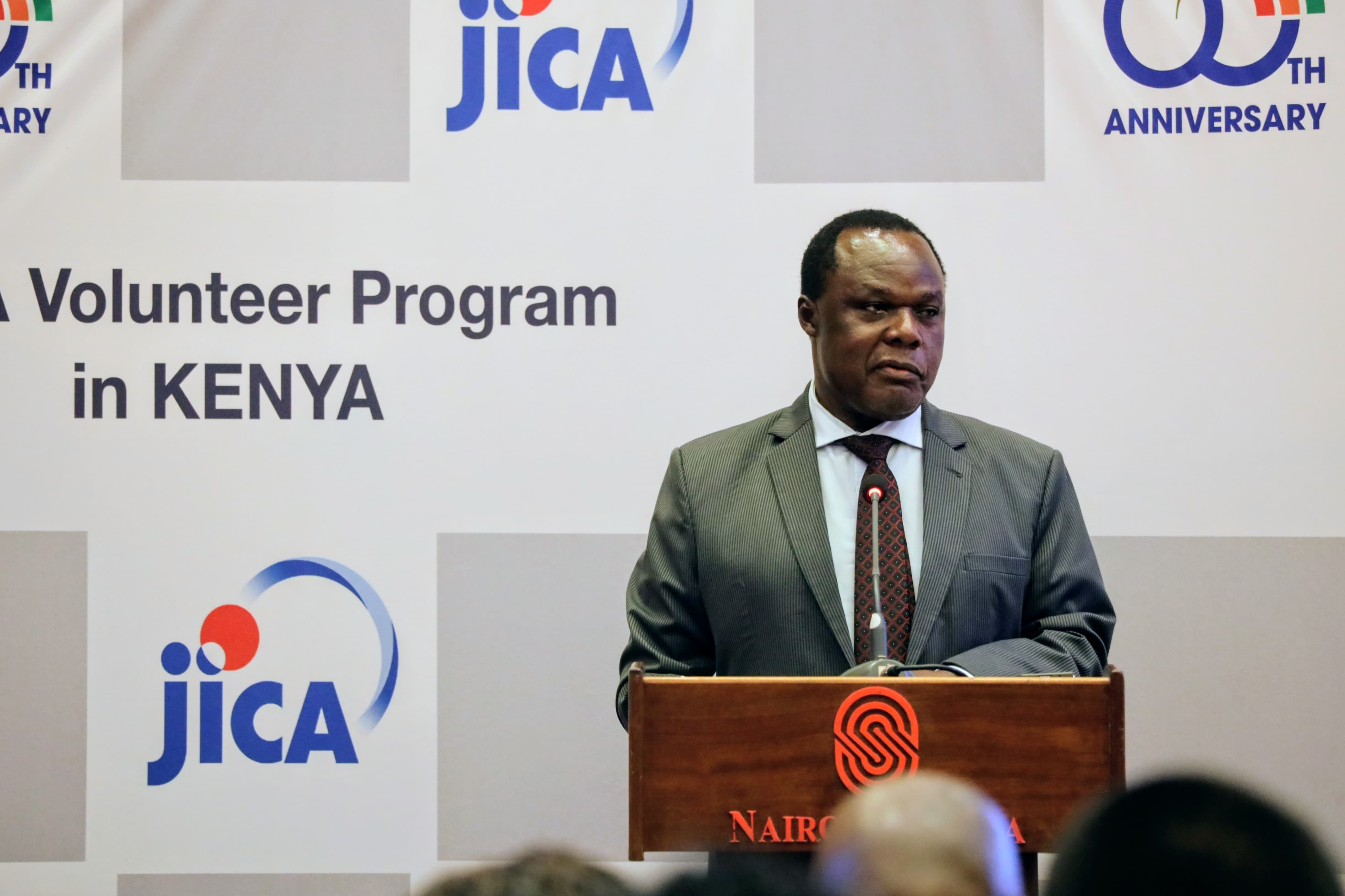 Principal Secretary for Industry Dr. Juma Mukwana delivering his speech during the Japan International Cooperation Agency (JICA) Volunteer programme 60th Anniversary in Nairobi.