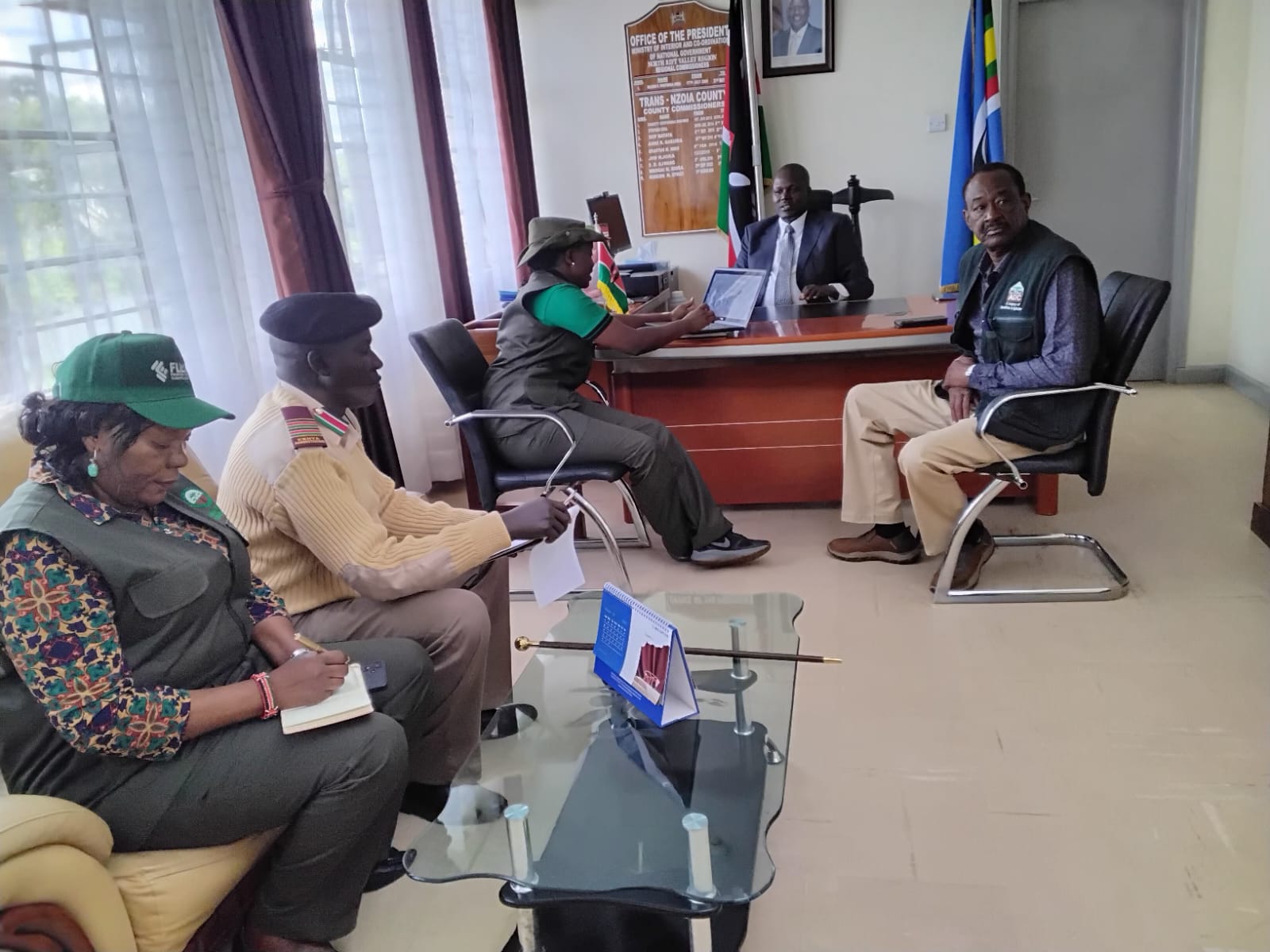Environment, Climate Change and Forestry Cabinet Secretary Dr. Deborah Barasa flags off coffee and avocado seedlings to farmers at the Trans Nzoia County Commissioner’s residence.
