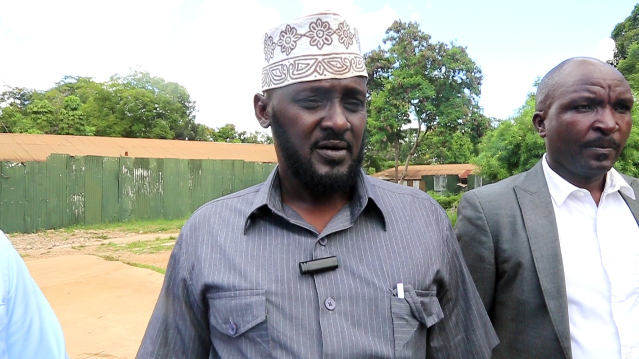 Kitui county director of education Dr Issack Hassan addressing the media 
