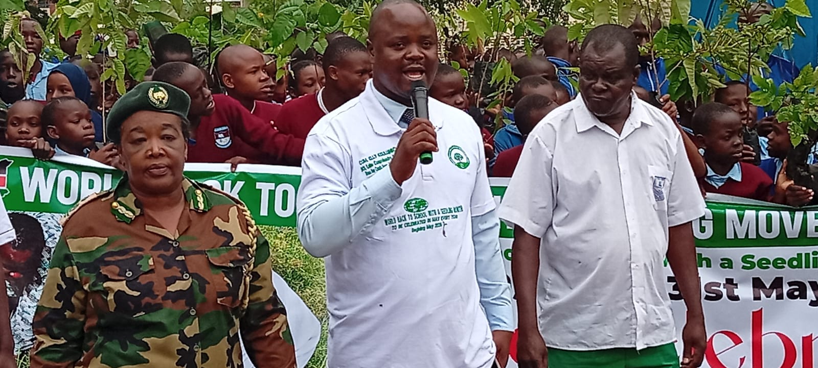  Lake Primary School learners, Kenya Forest Service and tree ambassadors plant trees at the school in a tree planting initiative.