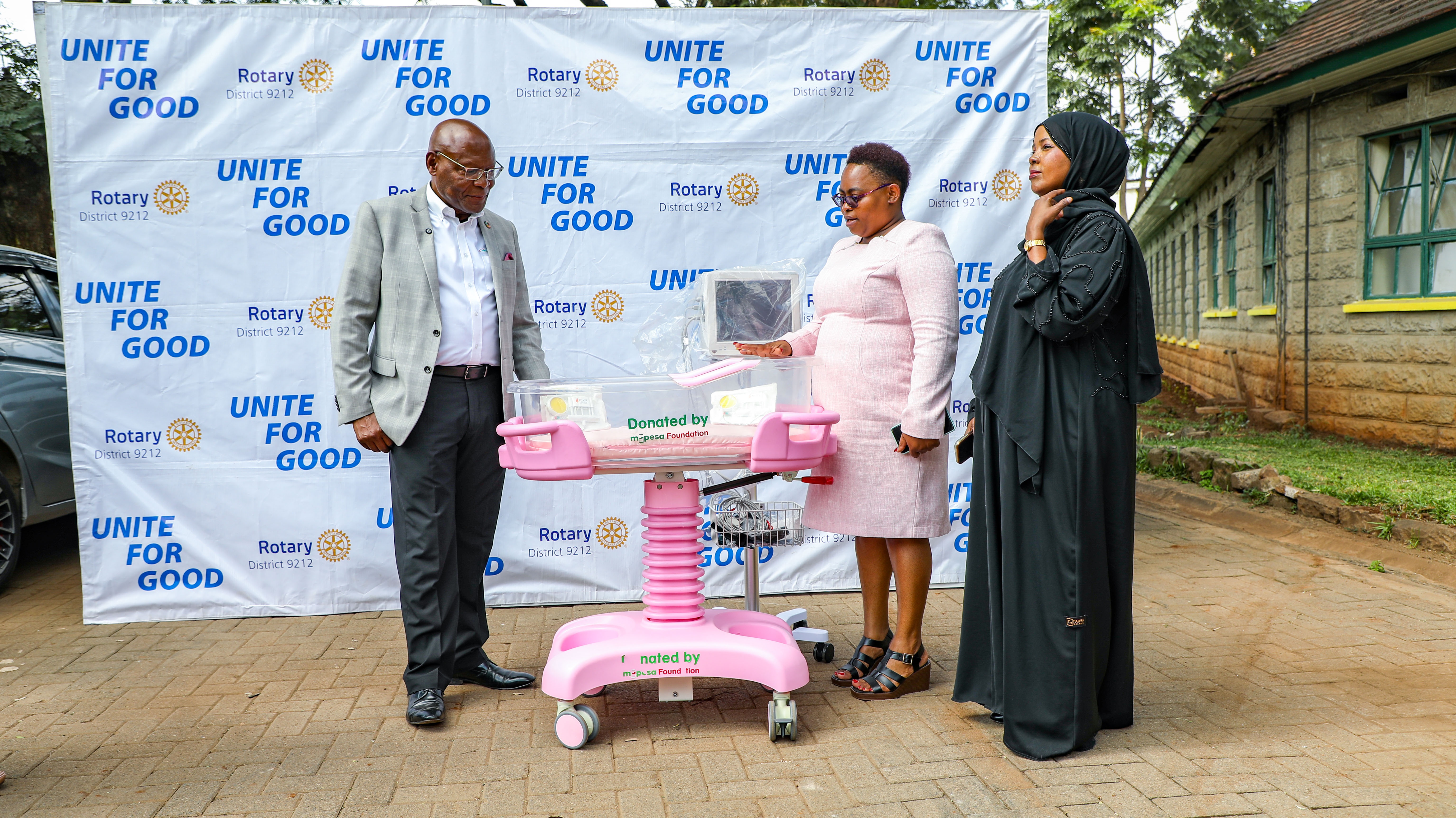From left: Safaricom Foundation Chairman Joseph Ogutu, Pumwani Maternity Hospital CEO Christine Kiteshuo and Nairobi County Chief Officer for Medical Services Maryam Dahir inspect equipment donated to the hospital to support maternal and newborn healthcare services.