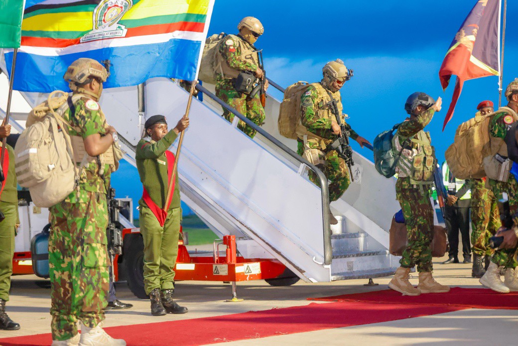 National Police Service officers returning home after completing a highrisk international peace support mission in Haiti under the Multinational Security Support framework.
