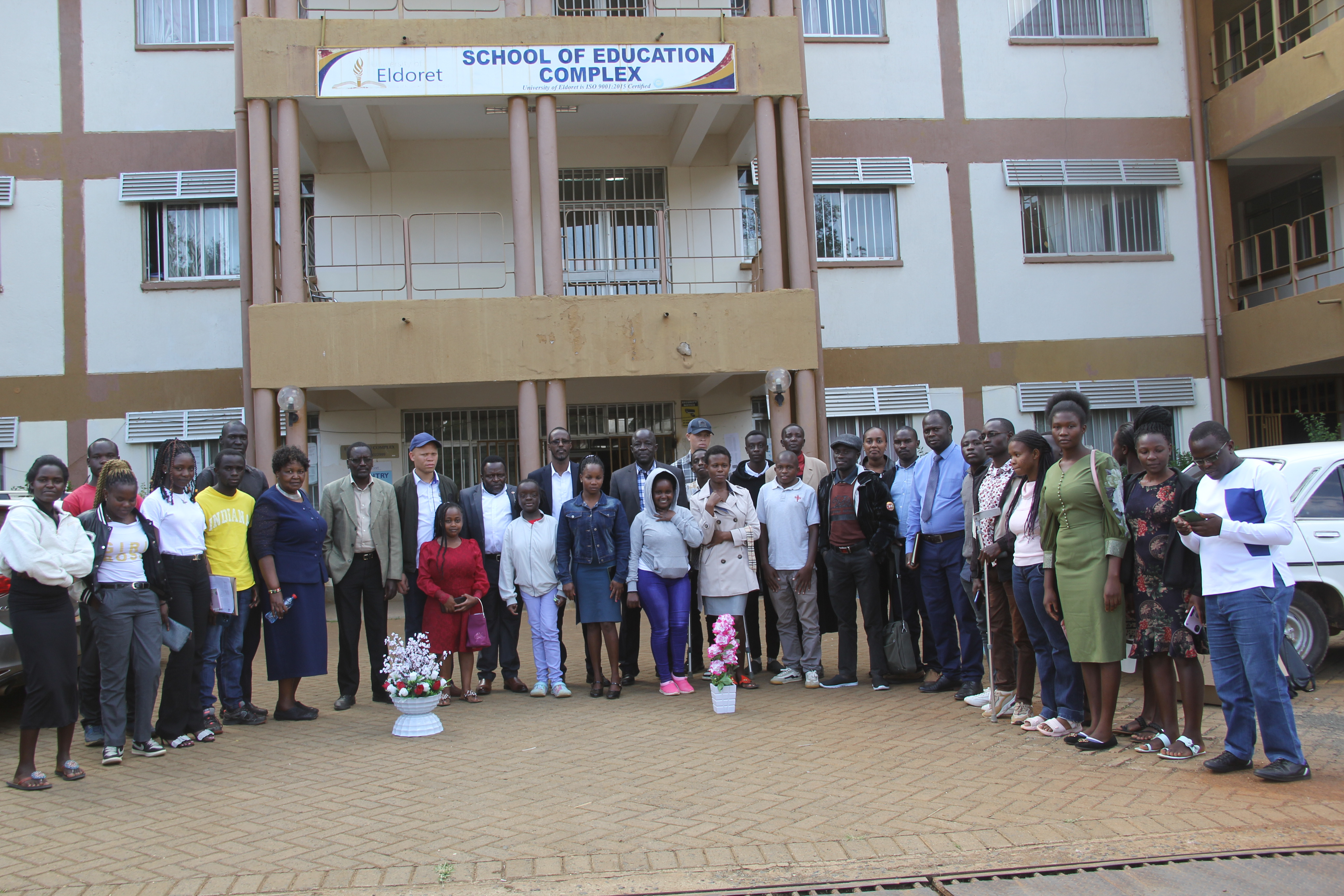 PWD students posing for a photo with the NCPWD team, during the launch of Tunza Mentorship and Career Guidance Programme, Eldoret University, Uasin Gishu