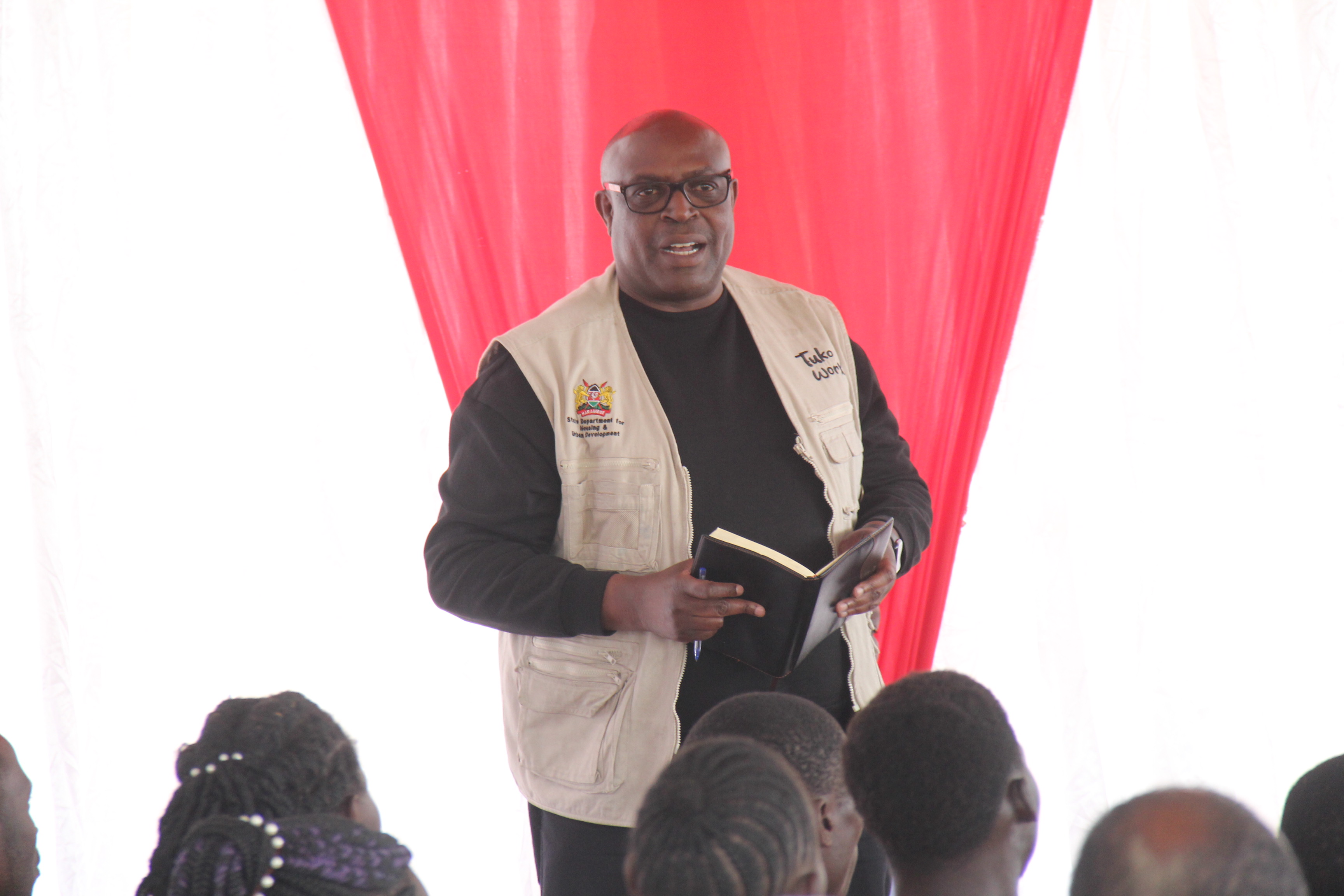 The Secretary of the Integrated Project Delivery Unit for the affordable housing program, Cassius Kusienya, addressing a section of residents of Nasewa during the site handing over for the Affordable Housing Project.