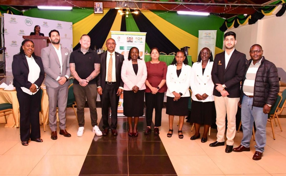 Ps TVETs Esther Muoria with chief principals drawn from different TVET institutions and Signet institute of Australian officials pose for a photograph
