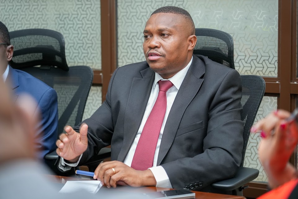 Principal Secretary for Broadcasting and Telecommunications Stephen Isaboke address members of the Joint Stakeholder Committee on AFCON Broadcasting Preparedness during a meeting at Talanta Stadium in Nairobi to assess broadcasting