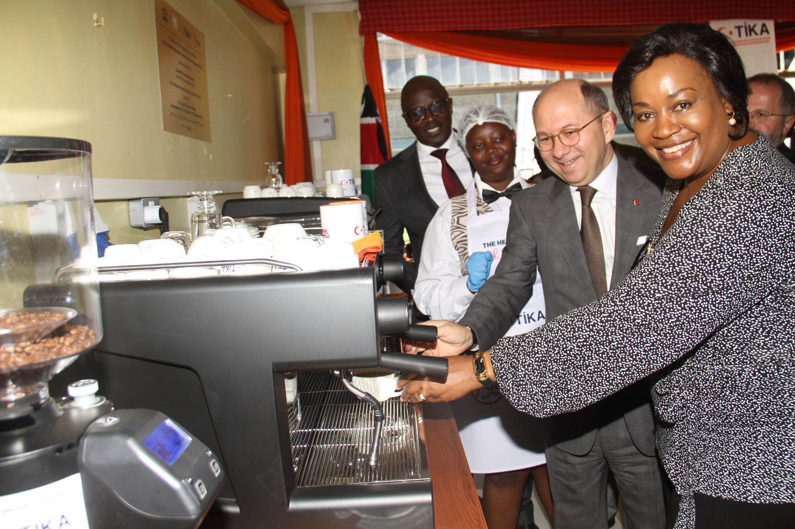 Turkish Ambassador to Kenya, Subutay Yuksel (right), during the handing over of state-of-the-art barista machines to Kenya Utalii College.