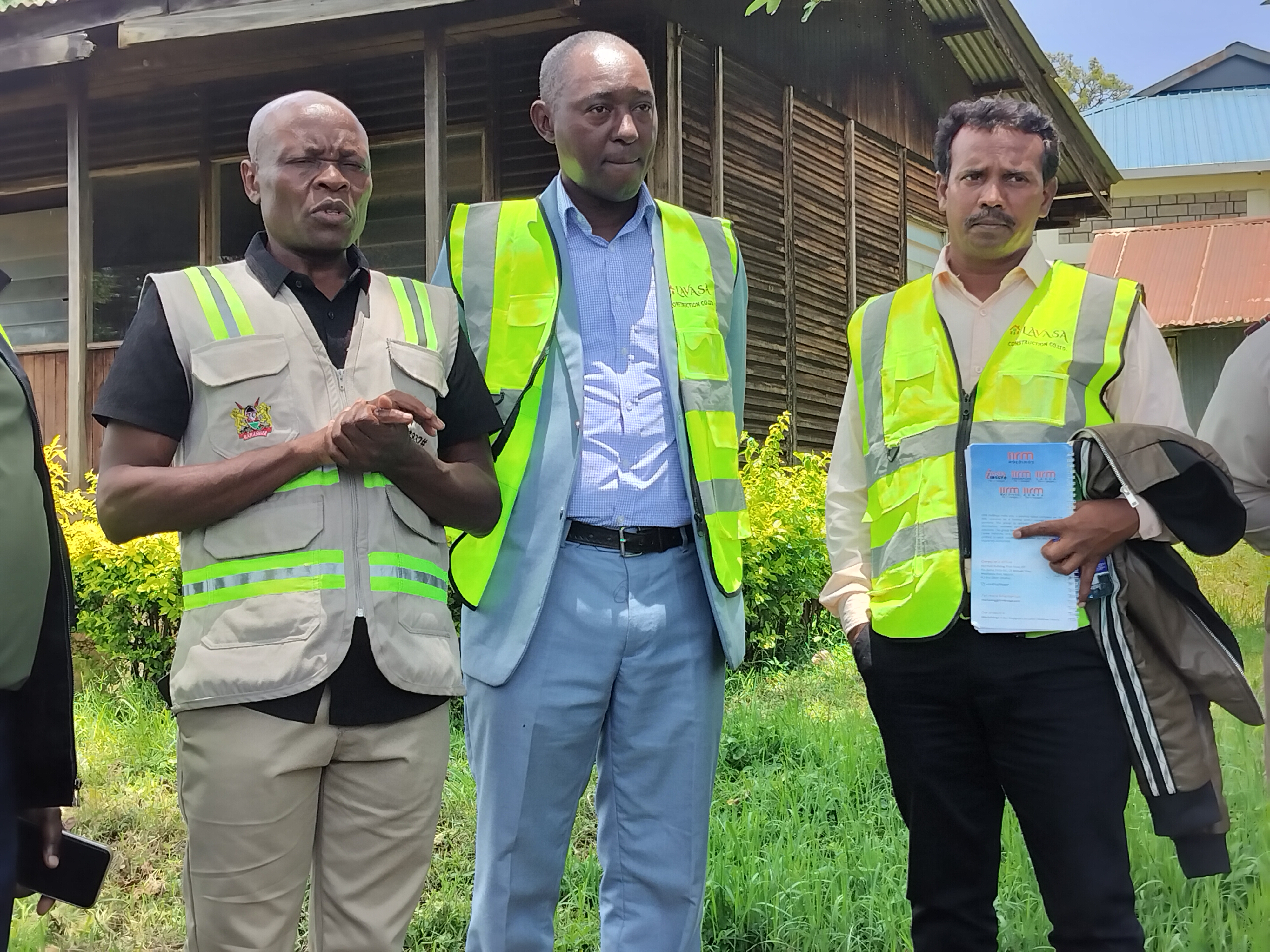 State Department for Housing and Urban Development Western Rift region team Lead Nyaigoti Mogeni (left) during the site handover ceremony for the Suneka Affordable Housing project in Suneka town, Bonchari Constituency in Kisii County. 