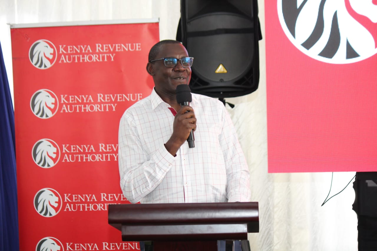 Kenya Revenue Authority (KRA) Commissioner for Micro and Small Taxpayers George Obell speaking to taxpayers from Kisii and Homabay counties during a taxpayers engagement forum.
