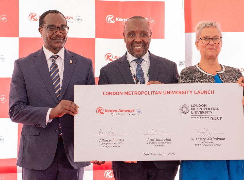 (From L to R) Cabinet Secretary for Education Julius Ogamba, Kenya Airways Chief  Executive Officer, Allan Kilavuka and The London Metropolitan University Vice-Chancellor  Julie Hall pause for a photograph after signing a partnership between Kenya Airways and  the London Metropolitan University at Pride Center in Embakasi, Nairobi.