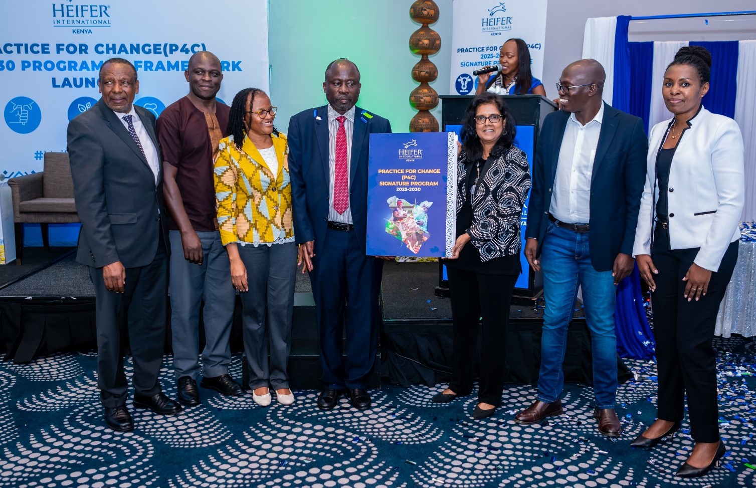  Clarice Bugo-Kionge, Country Director, Heifer international Kenya on the left, Dr. Christopher Wanga, Director of Livestock Policy Research at the Ministry of Agriculture, and Surita Sandosham president and CEO heifer international during the launch of heifers Kenya signature program framework