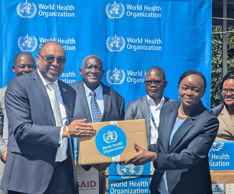 World Health Organization Country Representative Dr. Abdourahmane Diallo hands  over Mpox drugs and testing kits to the Cabinet Secretary of Health Dr. Deborah  Barasa during the handover ceremony of the kits held at Afya House in Nairobi.