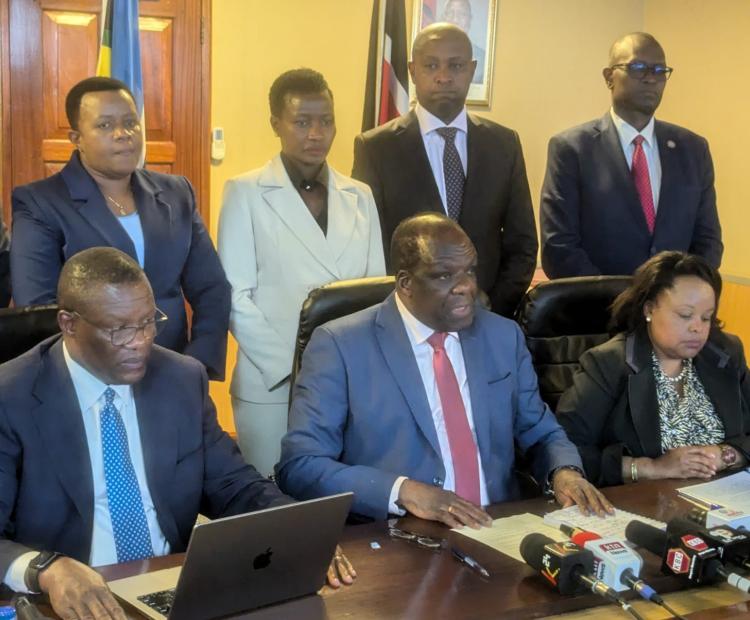 CS for Co-operatives and Micro, Small and Medium Enterprises (MSMEs) Development, Wycliffe Oparanya (C) and the Deputy Chief of Staff, Performance and Delivery Management Eliud Owalo (left) addresses the media at the NSSF building.