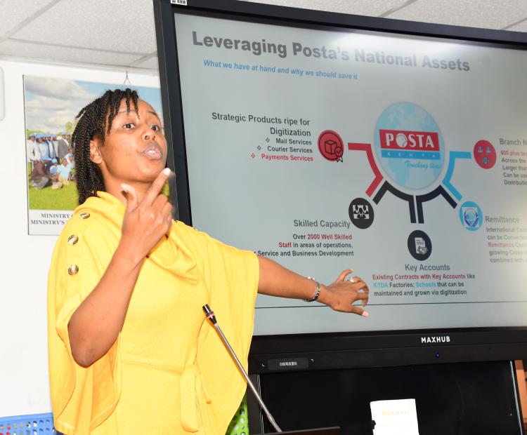  Postal Corporation strategic consultant Alice Gathoni, taking the participants through  a presentation on the Postapay app at Teleposta Towers on 19th November, 2024 during  the sensitization and demonstration meeting. The platform is interoperable and works  across all networks and has unique features. Photo/ Norah Bochere