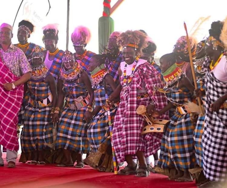 President William Ruto enjoys a dance during the Turkana cultural and tourism festival. 