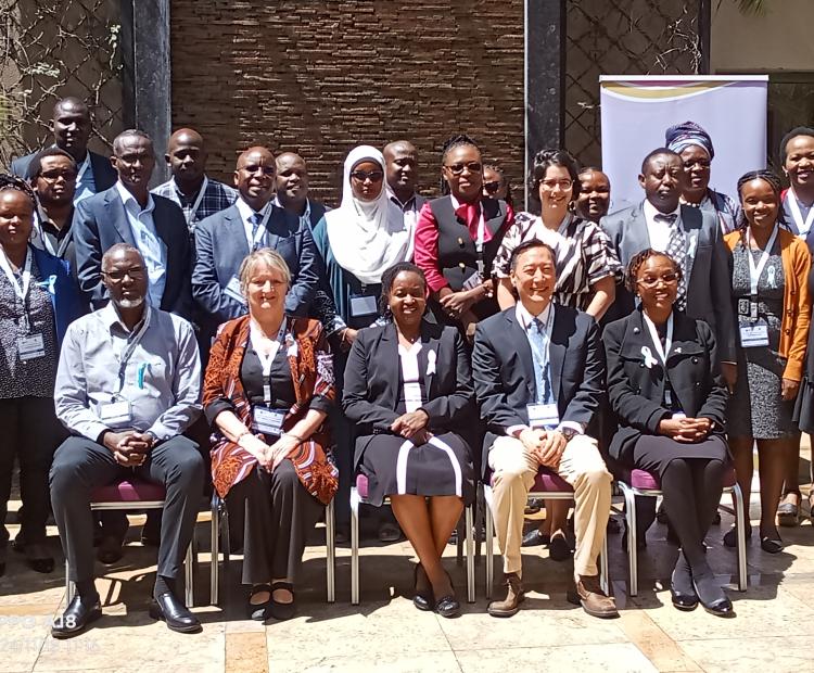 The Acting Head of the Division of Non-Communicable Diseases at the Ministry of Health Dr. Gladwell Gathecha (Seated Centre) poses for a photo with other health stakeholders during National Human Papillomavirus (HPV) and Cervical Cancer Symposium in Nairobi.
