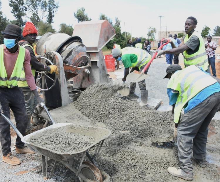 Ongoing improvement of road to bitumen standards in Maili Inne informal settlement.