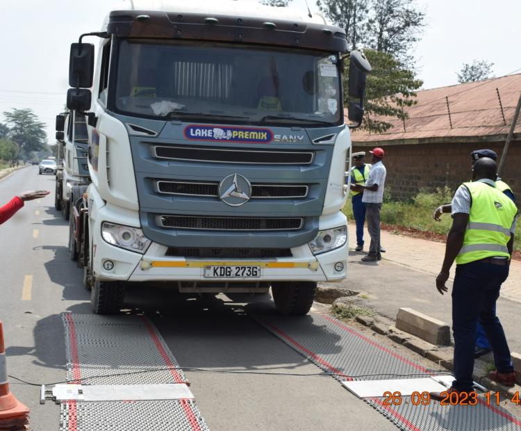 Surveillance officers check a vehicle on compliance to Axle Load limits on the Kenyan highways.