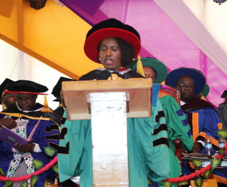 The Principal Secretary for Higher Education and Research, Beatrice Inyangala address graduands during Alupe University’s third graduation Ceremony.