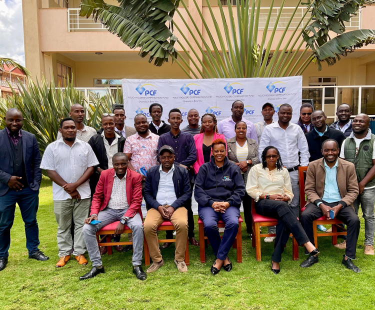 The Fund's Deputy Director - Corporate Communications Ms. Rosemary Kavili (seated middle) with the Fund's staff and local journalists after a successful media training workshop at the sidelines of the Fund's PCFMtaani campaign in Meru County.