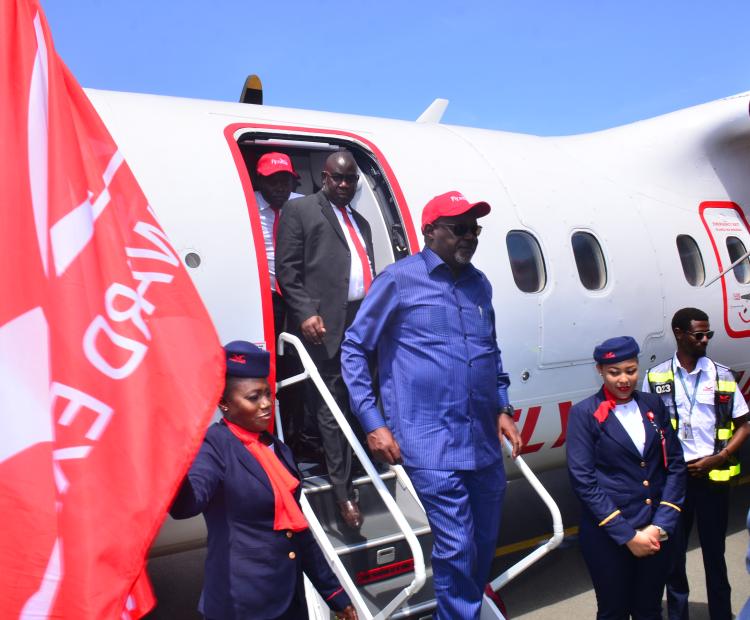 Passengers alighting at the Lichota Airstrip in Migori County. Lichota had the potential to grow, especially with the proposed changes to its runaway from 1.2 Kilometers to 2 Kilometers. PHOTO: FILE