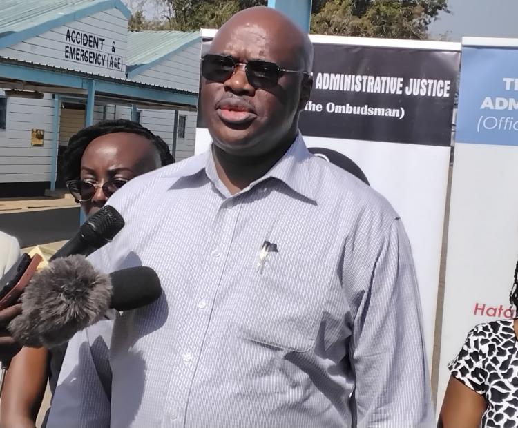 The Commission on Administrative Justice Chairman Charles Orinda addressing the media at Jaramogi Oginga Odinga Teaching and Referral Hospital (JOOTRH) in Kisumu during a spot check on the Social Health Authority (SHA) PHOTO: CHRIS MAHANDARA.