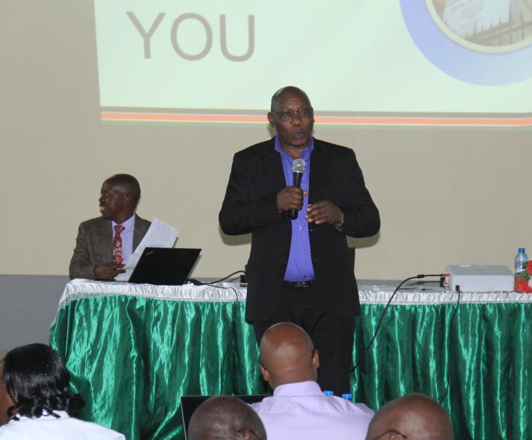 The head of Directorate for Primary Education, Ministry of Education Stephen Barongo speaking at St Annes Kisoko Girls High School during an engagement forum with stake- holders in education