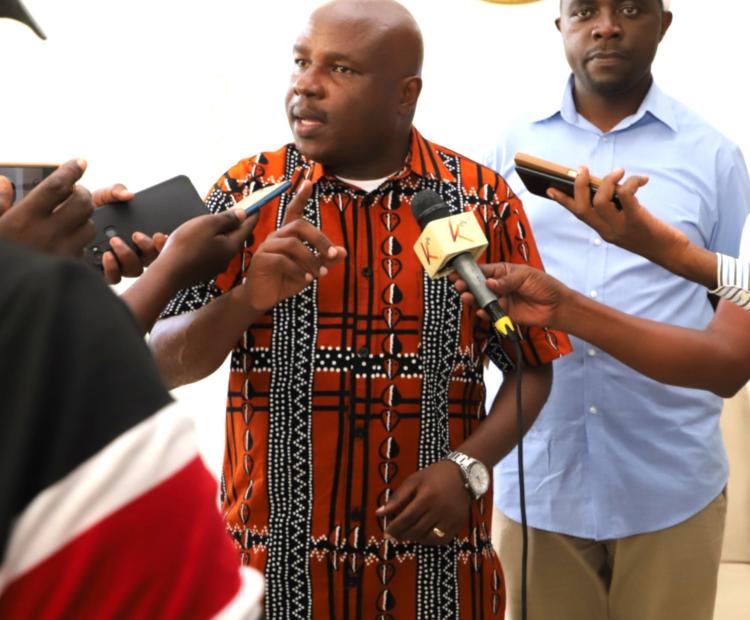  Labour and Skills Development Principal Secretary  Shadrack Mwadime (left) addresses the press.  He is flanked by Runyenjes MP  Eric Muchangi  Karemba.
