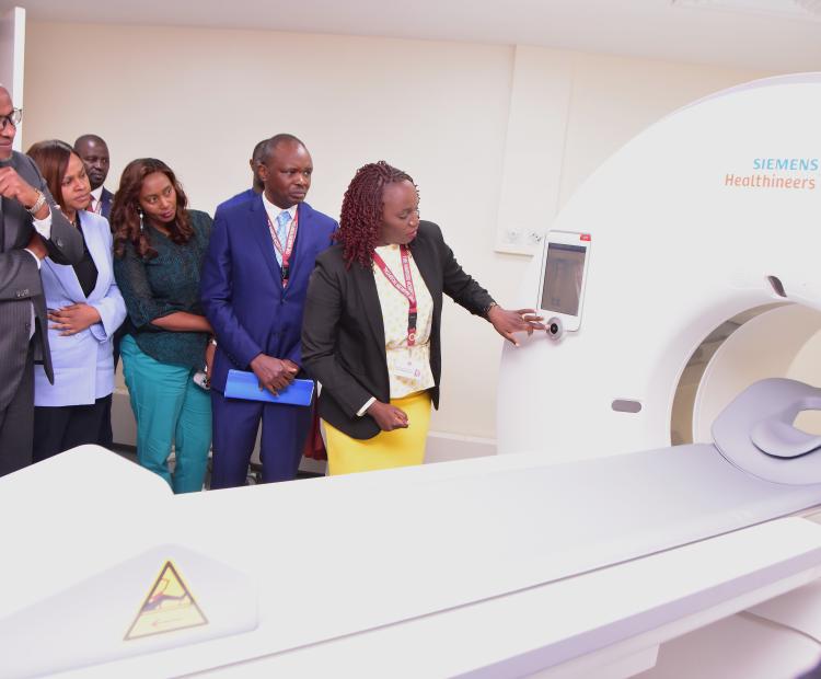 The AI-Powered CT Scanner being given a test run by the hospital’s Chief Radiologist as the Health Cabinet Secretary Aden Duale (Far L) looks on