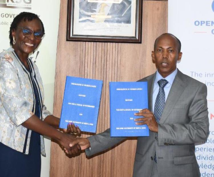 Prof Nura Mohamed (right), Director-General at the Kenya  School of Government exchanging a signed strategic  partnership agreement with the Open University of Kenya  Deputy Vice Chancellor, Prof Carolyne Omulando. Photo/Walter  Mikwa