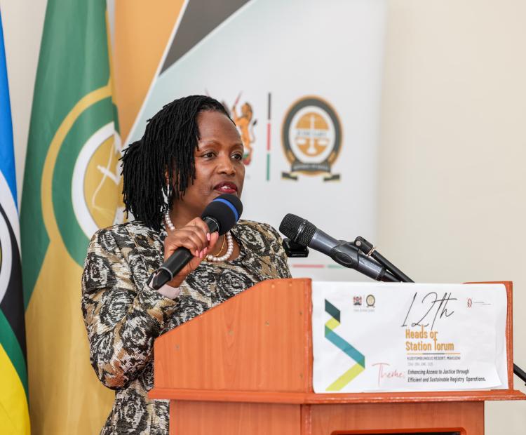 udiciary Chief Registrar Winfridah Mokaya addressing the 12th Annual Head of Stations Forum at a Hotel
