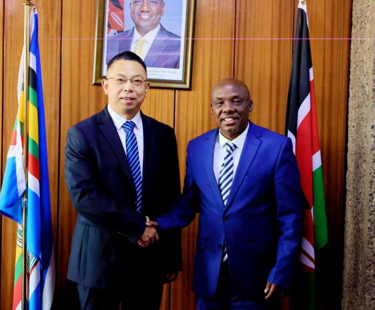 Principal Secretary, State Department for Agriculture, Kipronoh Ronoh (Right) and Qi Jun of China, during the high-level bilateral engagement in Kilimo House, Nairobi, where he hosted the Chinese Delegation.