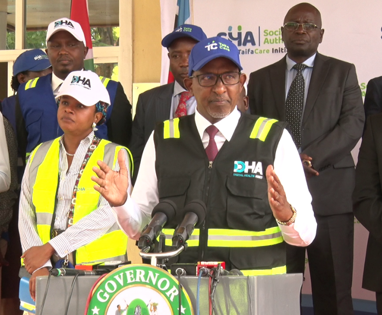 Health Cabinet Secretary Adan Duale speaking in Kakamega County. He was flanked by PS Medical Services Dr. Ouma Oluga (L), CEO, Social Health Authority CEO Dr. Mercy Mwangangi and Bishop Joseph Obanyi of Kakamega Catholic Dioceses (R) among other leaders. PHOTO BY MOSES WEKESA, KNA.