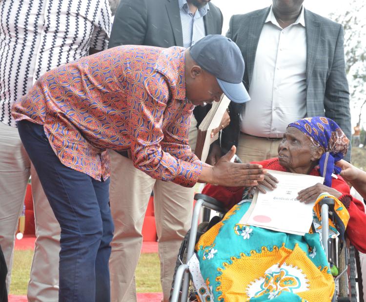 Deputy President Prof Kithure Kindiki issues a title deed to one of the land owners affected by the deadly April 29, 2024 flood incident that hit Mai Mahiu villages. He said the government plans to resettle all the 161 victims including tenants whose houses were equally destroyed. 