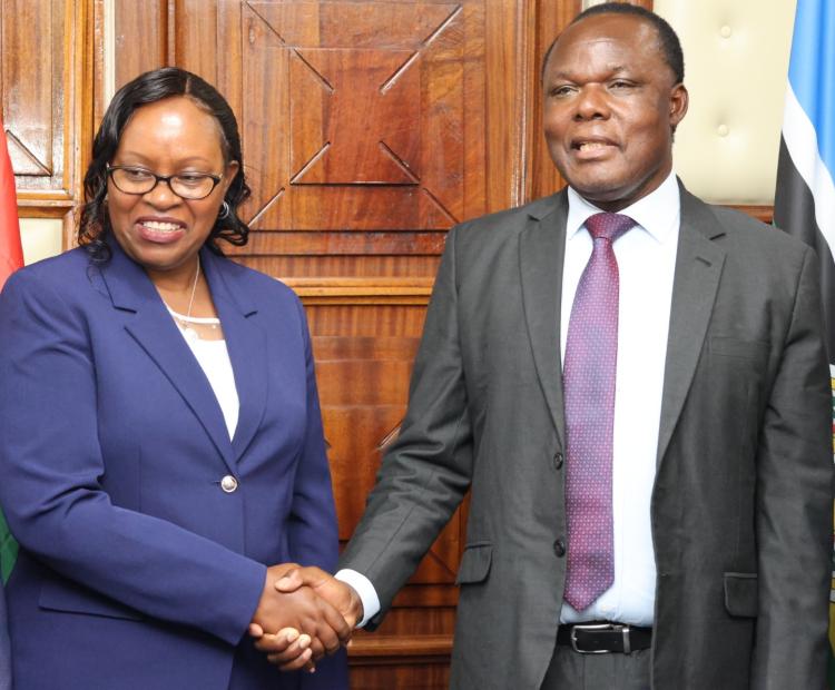 Industry Principal Secretary Dr. Juma Mukhwana (right) welcoming Dr. Monica Wanjiru Muiru, Vice Chairperson and Commissioner of the Ethics and Anti-Corruption Commission, to a meeting on compliance monitoring of the County Aggregation and Industrial Parks Programme at the State Department for Industry headquarters, NSSF Building in Nairobi.