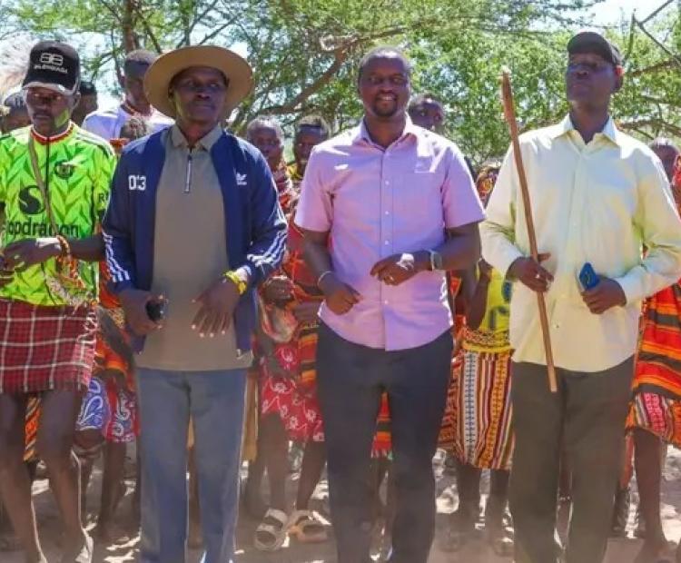 Health County Executive Committee Member Dr Joseph Epem in purple shirt doing a jig at Suguta during the launch of a new hospital. 