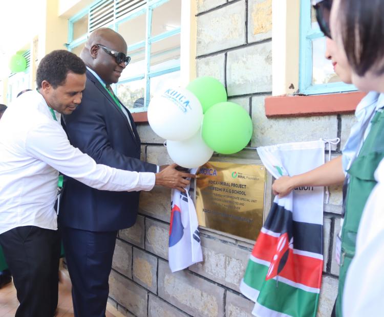  The Kisumu County Chief Officer for Education, Bovince Ochieng, (Left), Director of the Special Needs Education, Fredrick Haga (in blue suite) joined by the leadership from KOICA and Miral Welfare Foundation during the handing over ceremony of the new Intermediate Special Education Classroom at Ogwedhi PAG Primary School in Nyando Sub-County, Kisumu County