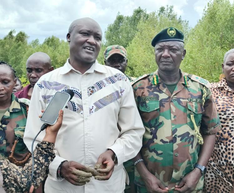 Conservation Secretary State Department for Wildlife Dr. John Chumo accompanied by Mombasa County Forest Conservator Bernard Wahome during a media briefing following a habitat restoration exercise at Miritini in Mombasa County. PHOTO: CHARI SUCHE
