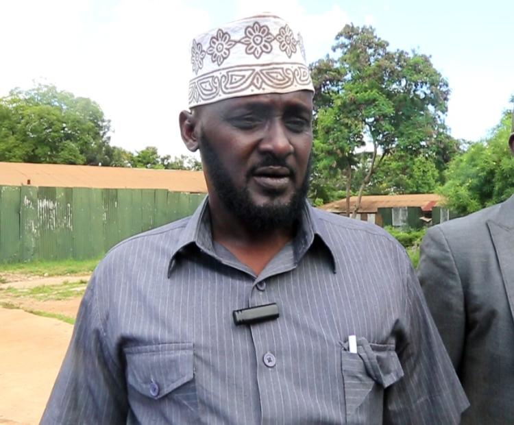 Kitui county director of education Dr Issack Hassan addressing the media 