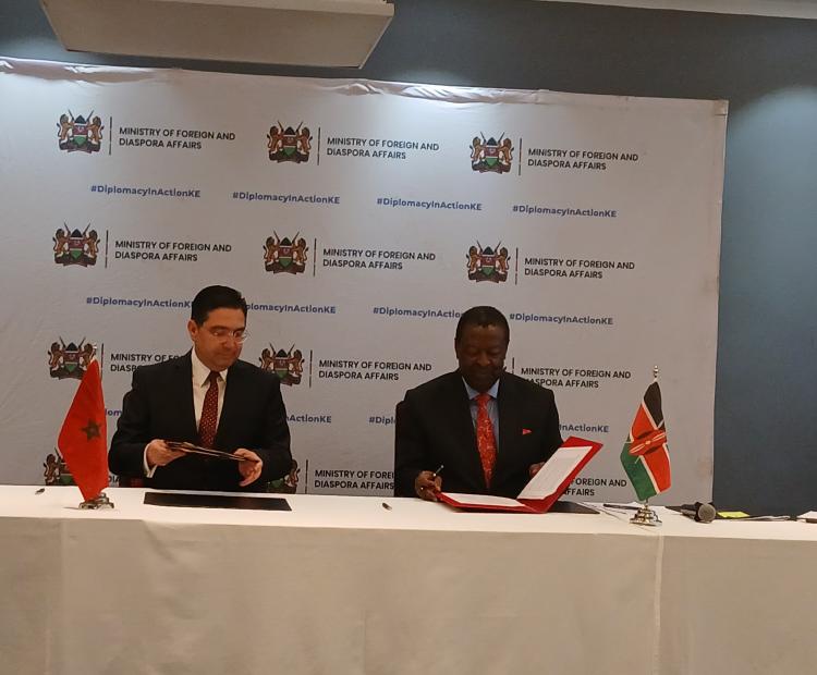Prime Cabinet Secretary (CS) and Cabinet Secretary for Foreign and Diaspora Affairs Musalia Mudavadi (Right) with his counterpart the Minister of Foreign Affairs of the Kingdom of Morocco Nasser Bourita sign the agreed minutes, MoUs and joint communique during the Inaugural Joint Commission for Cooperation (JCC) between the Republic of Kenya and the Kingdom of Morocco in Nairobi. 