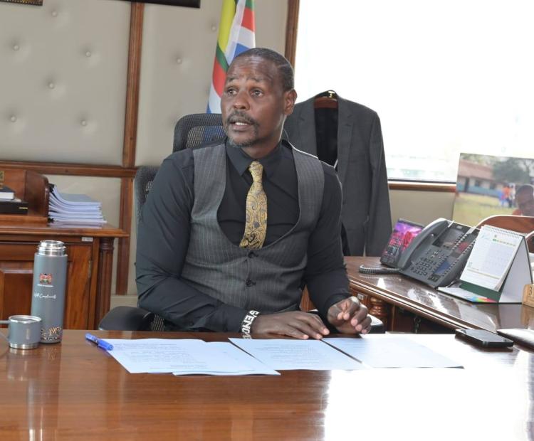Principal Secretary for Environment and Climate Change Dr. Festus Ngeno speaking during the Eldoret-Iten Water Project 4th Steering Committee hybrid meeting