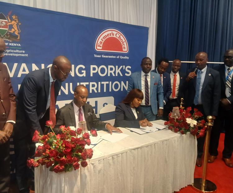 Principal Secretary (PS) for Livestock Development Jonathan Mueke (seated left) during the National Stakeholders’ Sensitisation Forum for the Pig Value Chain. 