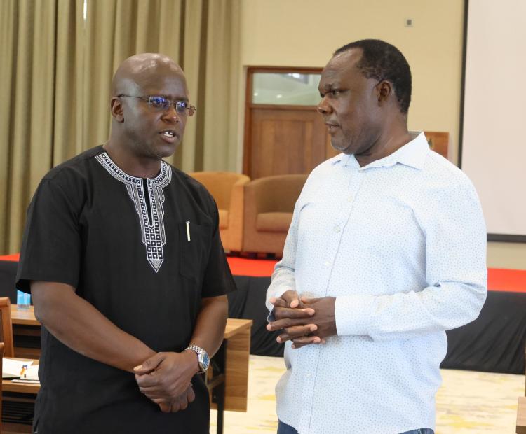 Dr. Walter Ongeti, KENAS CEO (left) and Dr Juma Mukhwana, PS State Department for Industry pictured during the meeting.
