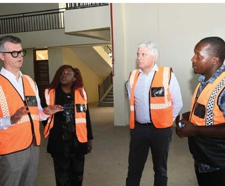 ASSOMAC President Mauro Bergozza, left, Krystal Midega of the Italian Trade Agency second left,  ASSOMAC Director General Agostino Apolito second right, and KLIP Site Engineer Gibert far right, during  a tour of the Kenanie Leather Industrial Park. 