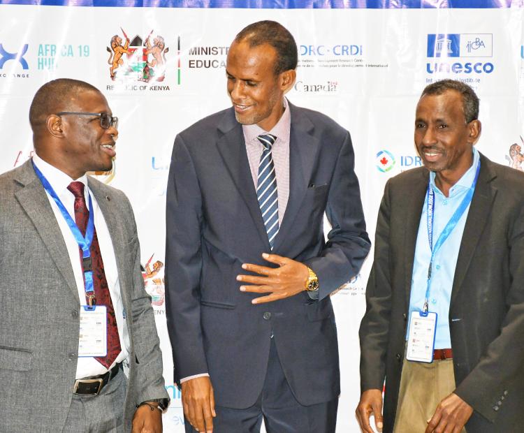 Ministry of Education Director General for Basic Education Dr Elyas Abdi (centre) alongside the Permanent Secretary for the Ministry of Education, Culture and Higher Education of Somalia Hassan Ali (right)