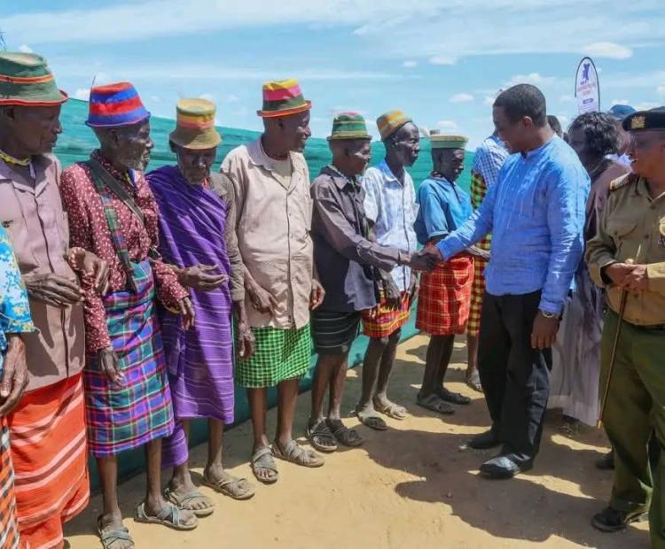 Cabinet secretary for Energy and Petroleum Opiyo Wandayi is received by elders at Amosing, Turkana East sub county ahead of ground breaking ceremony for oil production 