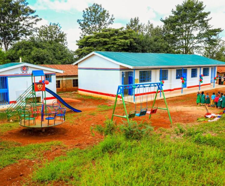 Learners interacting outside the newly constructed ECDE classrooms in Kiambogo and Mbathi villages in Kijabe Ward. PHOTO: ELIZABETH NYAMOTAI