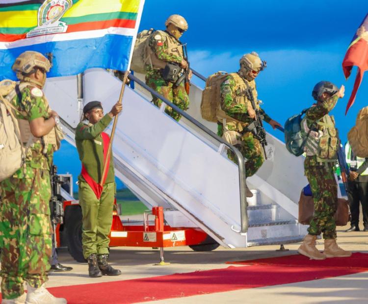 National Police Service officers returning home after completing a highrisk international peace support mission in Haiti under the Multinational Security Support framework.