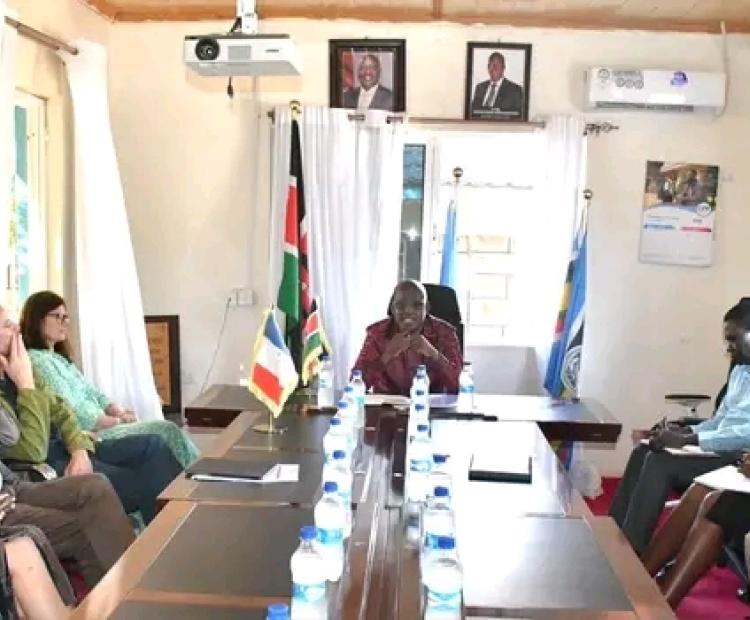. Turkana County Governor Jeremiah Lomorukai chairs a meeting attended by the EU ambassador to Kenya Henriette Geiger and the French Ambassador Arnaud Suquet before commissioning of the green mini grid project in Locheremoit, Turkana 